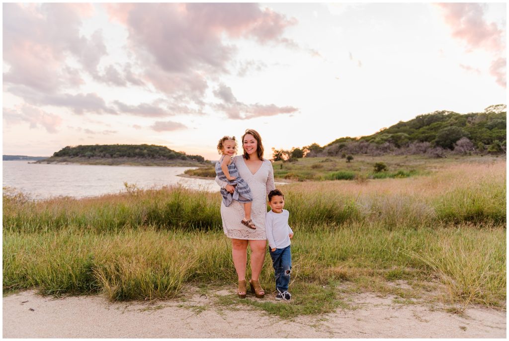 Beautiful mother with her 2 young children at the Stillhouse Hallow Lake in Belton Texas.